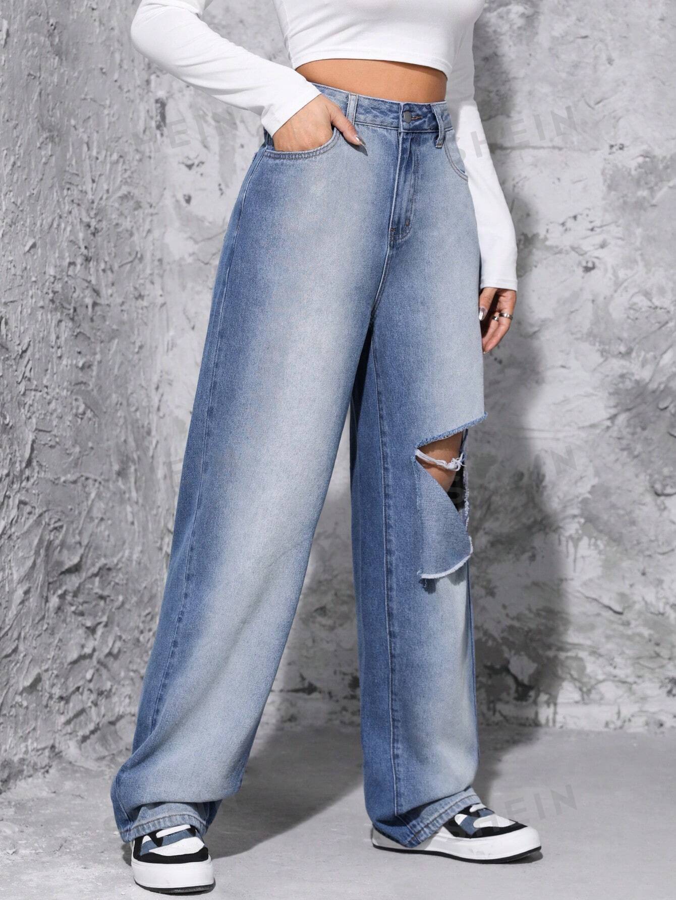 جينز ممزق عالي الخصر وواسع الساق