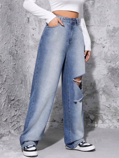 جينز ممزق عالي الخصر وواسع الساق