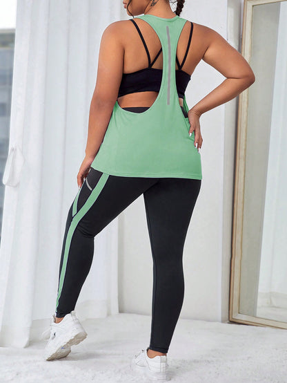 طقم لباس رياضي بشريط جانبي متباين مع جيب الهاتف الخليوي مقاس كبير