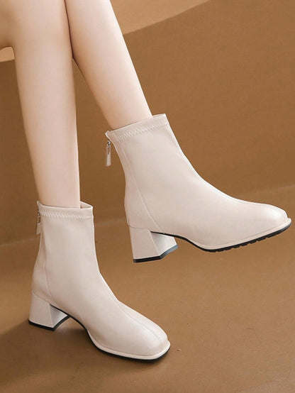 حذاء بوتي مدبب بكعب مرتفع معتدل للسيدات ذوي الكعب السميك بنمط فرنسي نعل مدبب مثالي للفساتين