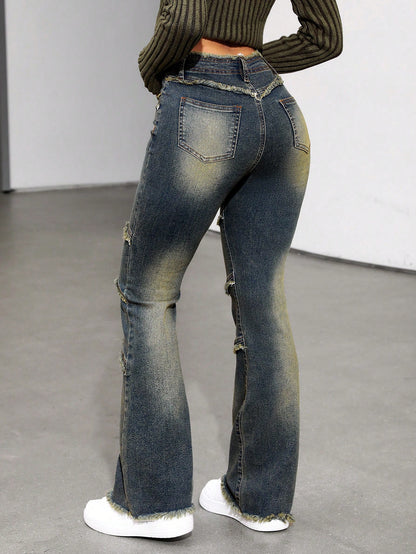 بنطلون جينز موسع للساقين بطرف ممزق مغسول بالماء