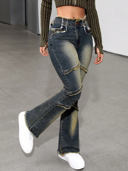 بنطلون جينز موسع للساقين بطرف ممزق مغسول بالماء