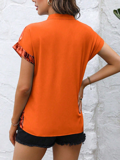 بلوزة أكمام الخفاش طبعات عشوائية