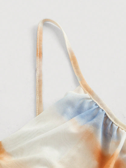 قميص نسائي بلا أكمام وردي اللون بطبعة عقد شاولين غير منتظمة