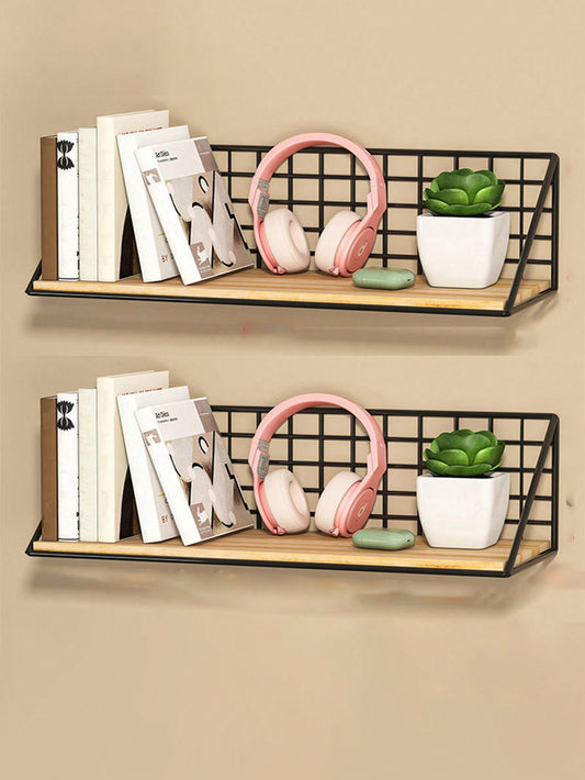 رف بسيط للكتب يتم تركيبه على الحائط بواسطة الحديد