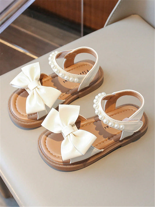 جزمة صيفية مسطحة مريحة للفتيات الجديدة بعقدة لطيفة من اللؤلؤ الموضة