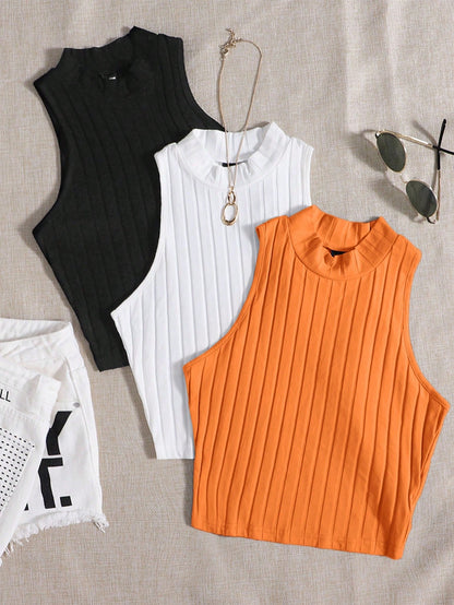 بلوزة نسائية بدون أكمام ذات لون سادة ورقبة