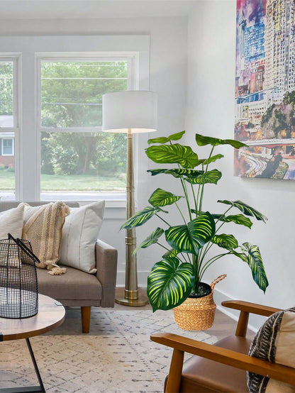 نبات صناعي كبير بحجم 35.48 بوصة ب-18 فرع تمثل أوراق كأنها ظهر السلحفاة وأوراق الأناناس الخضراء مزينة بأوراق كبيرة مخططة مصطنعة للتزيين يستخدم في المكاتب و غرف المعيشة و غرف النوم والمطابخ مصنوع من بلاستيك صناعي خضراء لا يأتي مع الأواني الزراعية