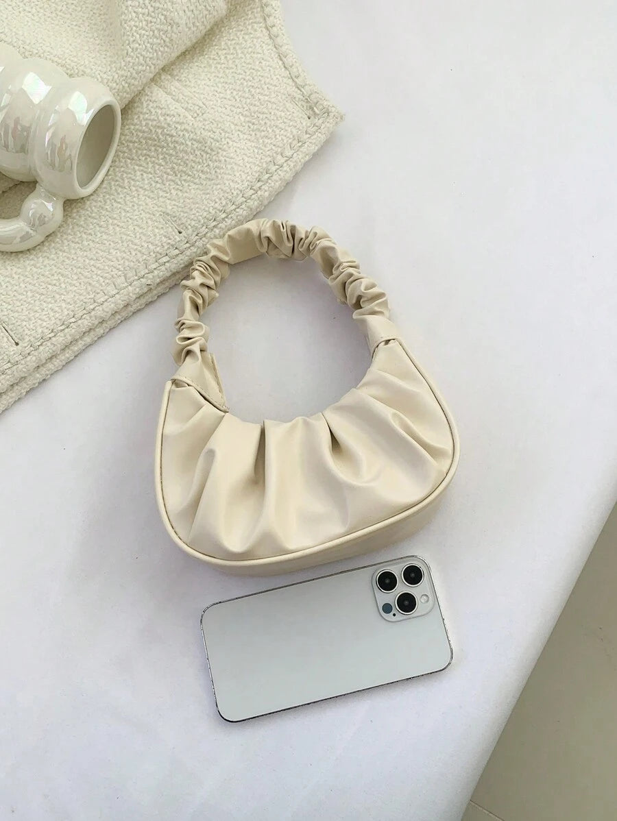 حقيبة نسائية مطوية صلبة صغيرة ذات لون صلب