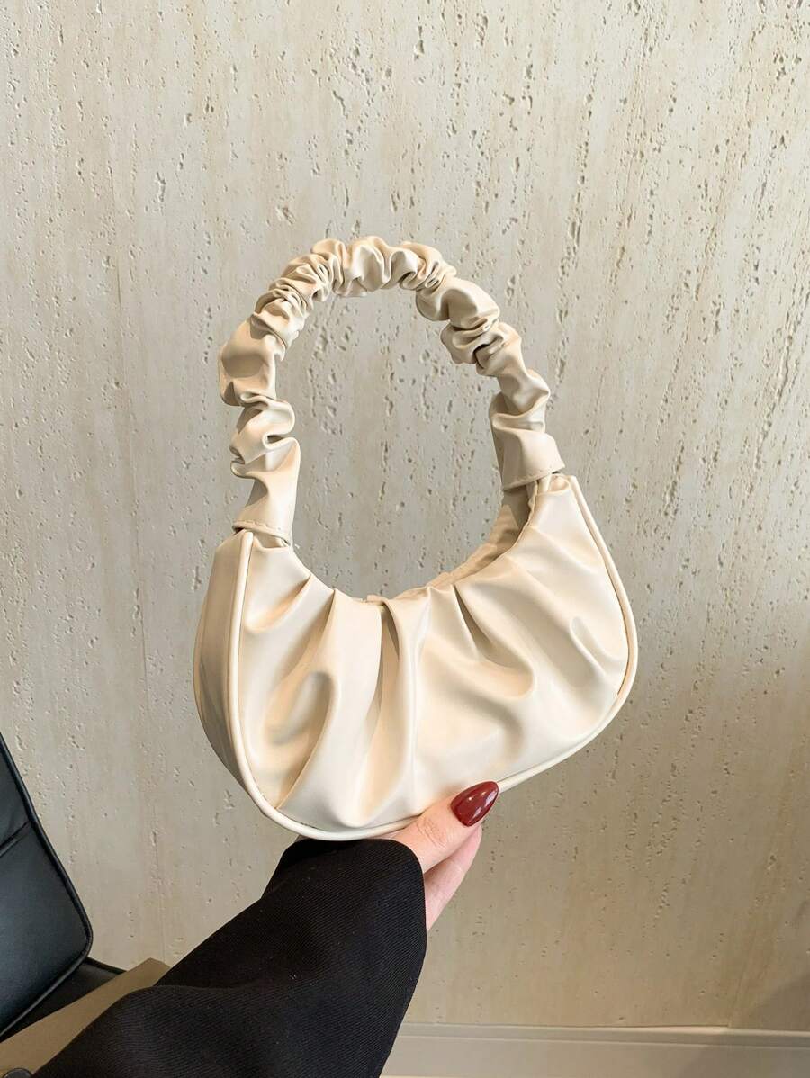 حقيبة نسائية مطوية صلبة صغيرة ذات لون صلب