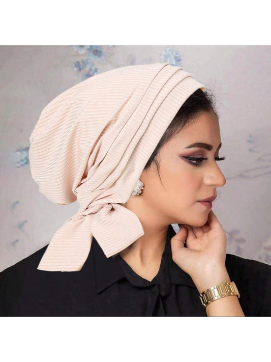 قبعة شعر بذيل طويل و بتصميم مخطط حلزوني من موحد اللون