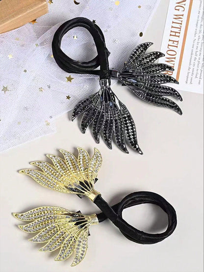 قطعة واحدة من صانعة كعكة الشعر المصنوعة من خليط معدني أسود مع ديكور من حجر الراين، أداة تصفيف كعكة سهلة الملتوية أنيقة