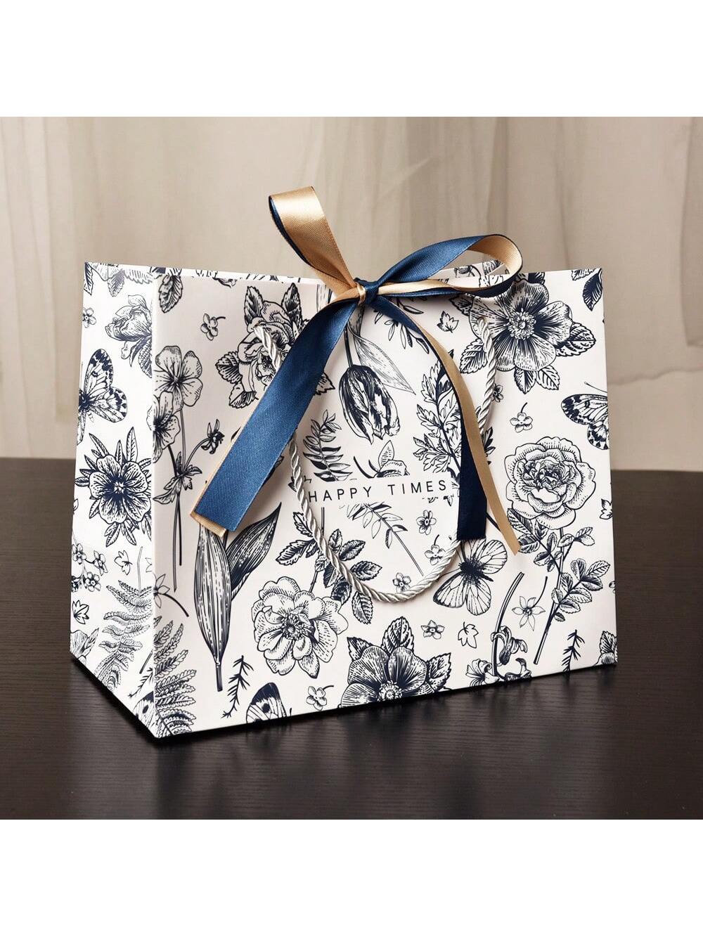 حقيبة هدايا ورقية مزخرفة بزهر الأسلوب