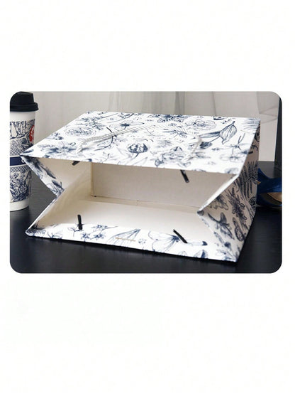 حقيبة هدايا ورقية مزخرفة بزهر الأسلوب