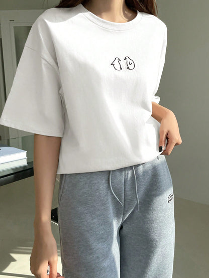 تي شيرت بأكمام قصيرة وتصميم فضفاض