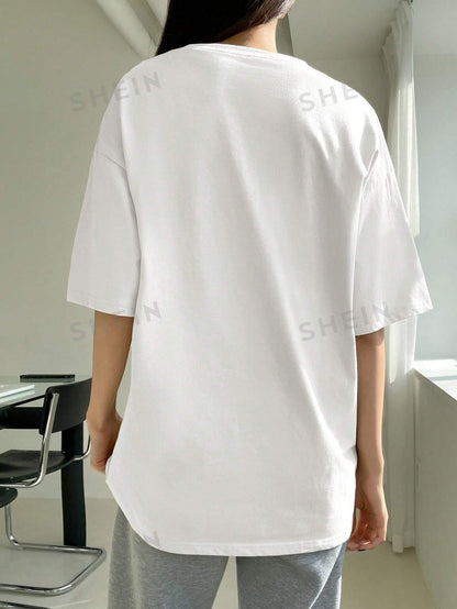 تي شيرت بأكمام قصيرة وتصميم فضفاض