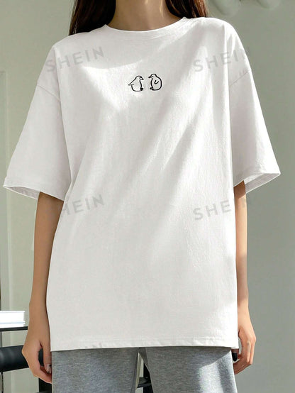 تي شيرت بأكمام قصيرة وتصميم فضفاض