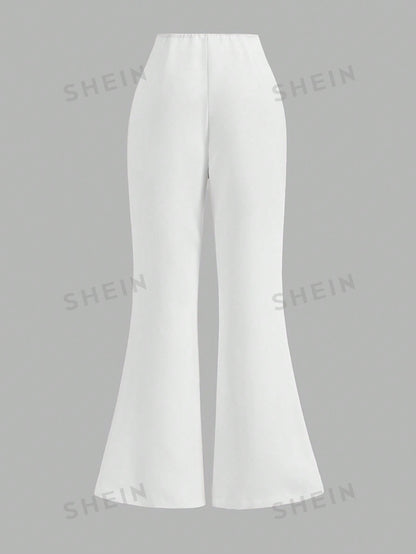 سروال نسائي عالي الخصر عريض مطوي بأسفل بسيط وأنيق بلون صلب