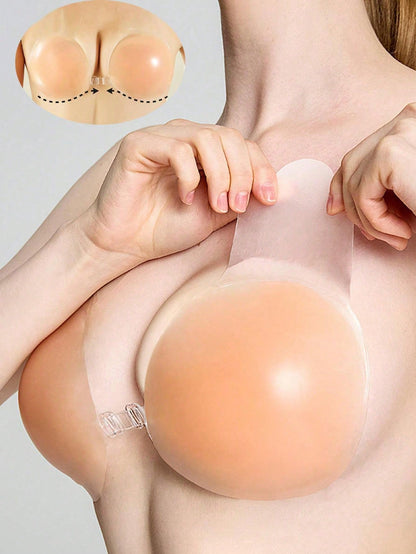 زوج من لاصقات ثدي السيليكون لرفع الصدر باللون المشمشي والشكل الكروي للنساء