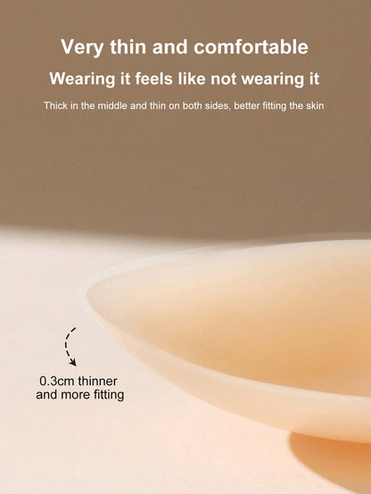زوج من لاصقات ثدي السيليكون لرفع الصدر باللون المشمشي والشكل الكروي للنساء