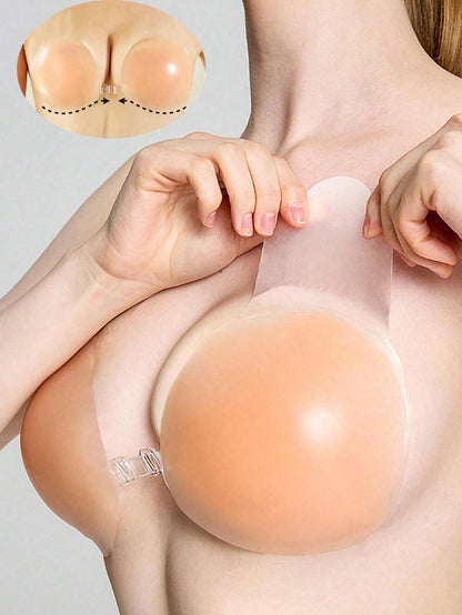 زوج من لاصقات ثدي السيليكون لرفع الصدر باللون المشمشي والشكل الكروي للنساء