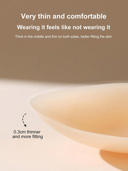 زوج من لاصقات ثدي السيليكون لرفع الصدر باللون المشمشي والشكل الكروي للنساء