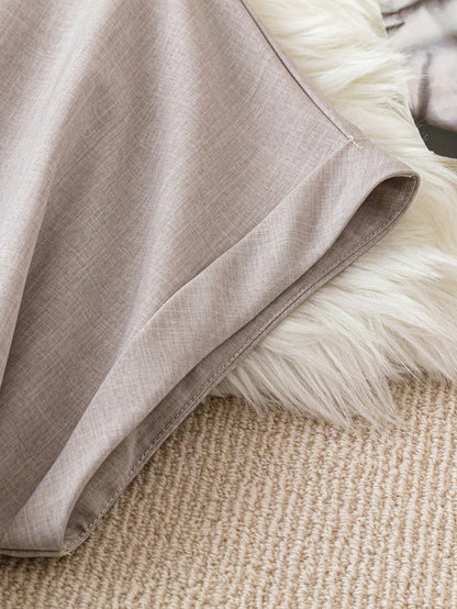 قميص نسائي بأكمام الخفاش بياقة مشقوقة بلون سادة