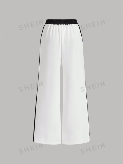سروال واسع الساقين للنساء بتصميم بسيط وأنيق على شكل كتل الألوان مع شق جانبي