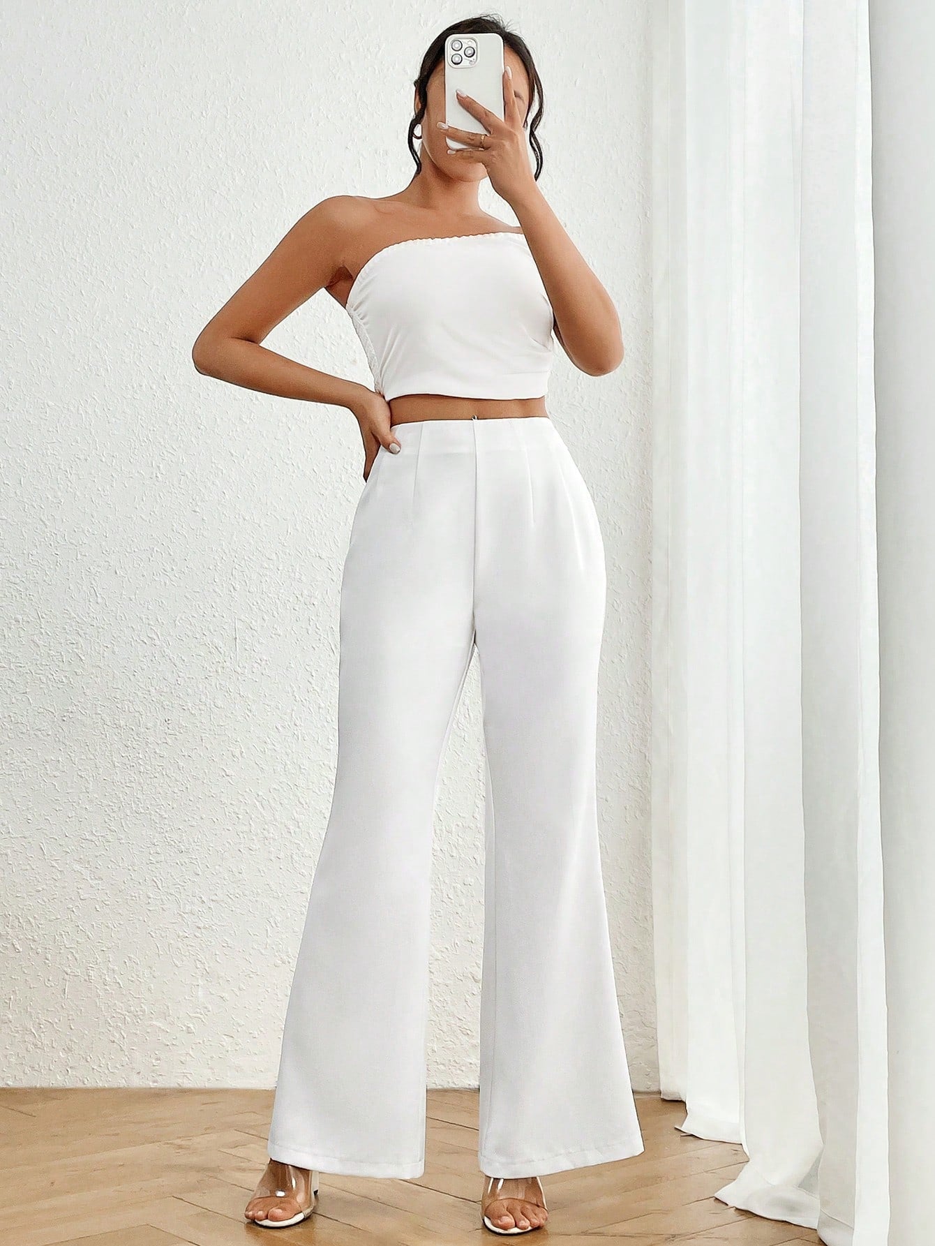 سروال نسائي عالي الخصر عريض مطوي بأسفل بسيط وأنيق بلون صلب