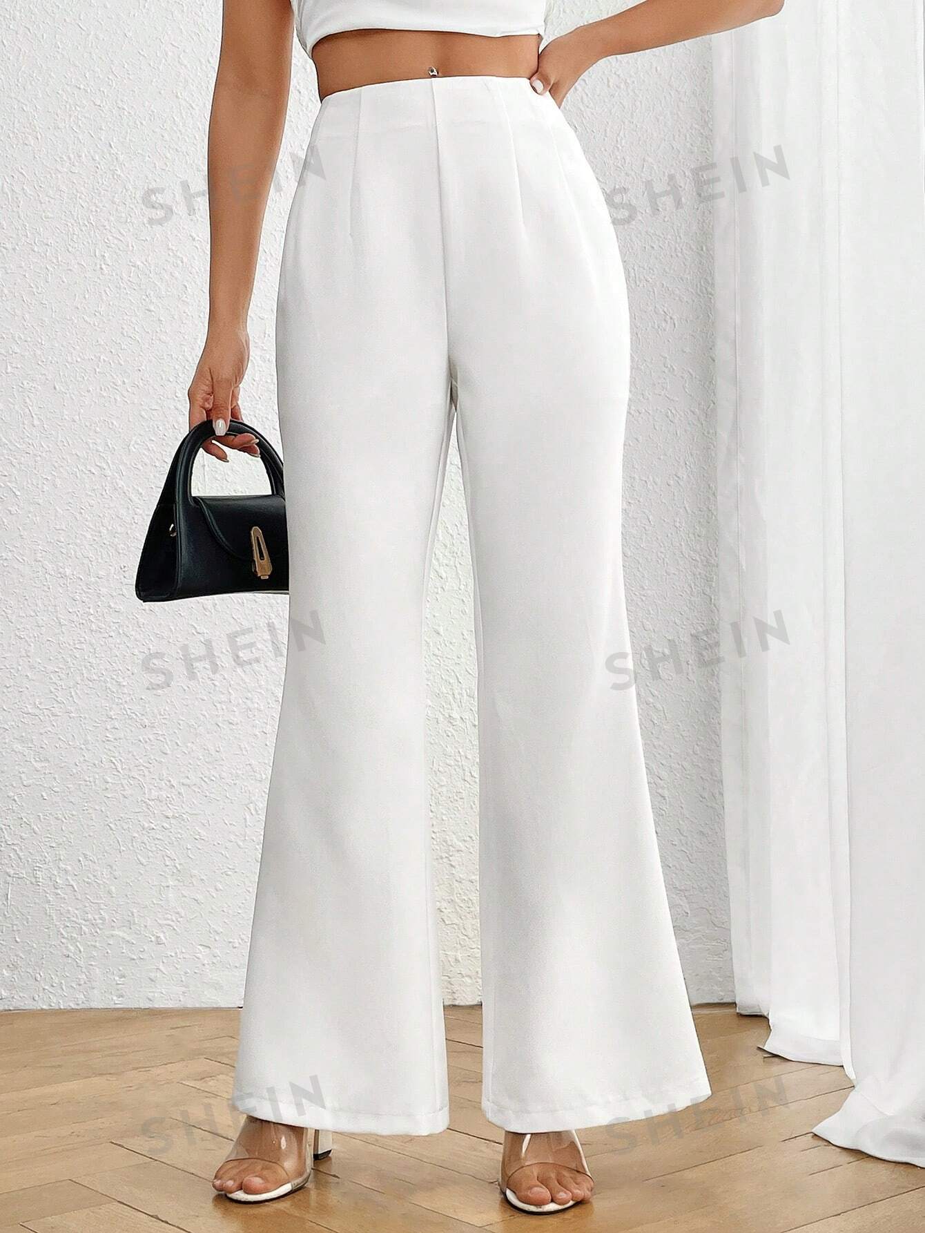 سروال نسائي عالي الخصر عريض مطوي بأسفل بسيط وأنيق بلون صلب