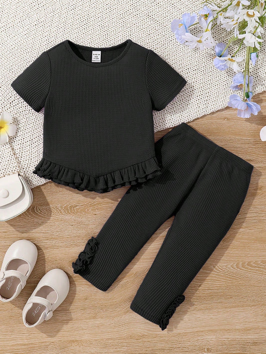 مجموعة ملابس علوية أكتاف غير متماثلة مكشكشة بلون أحادي وسروال ضيق للبنات الرضع