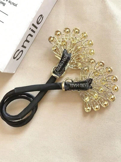 صانعة لفافة شعر على شكل ذيل الطاووس بالأحجار اللامعة، قطعة واحدة