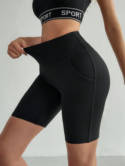 سروال يوغا رياضي نسائي بلون سادة مع جيوب (طول الركبة)