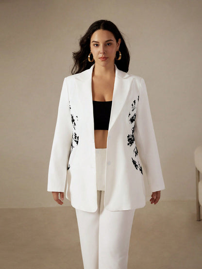 جاكيت بدلة واحدة الصدر مع طبعة زهرية مرصعة بقطعة كبيرة لجميع المقاسات واسلوب رجالي متنقل