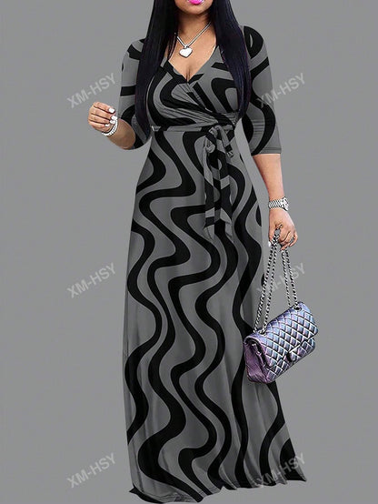 فستان كاجوال مطبوع بياقة على شكل حرف V وأكمام طويلة وخصر مربوط