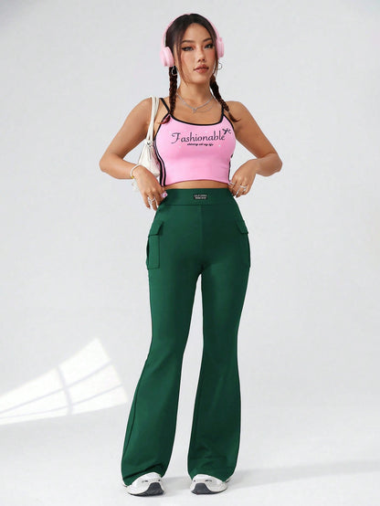 سروال نسائي منسوج بلون ثابت بتصميم جيب و أطراف متسعية