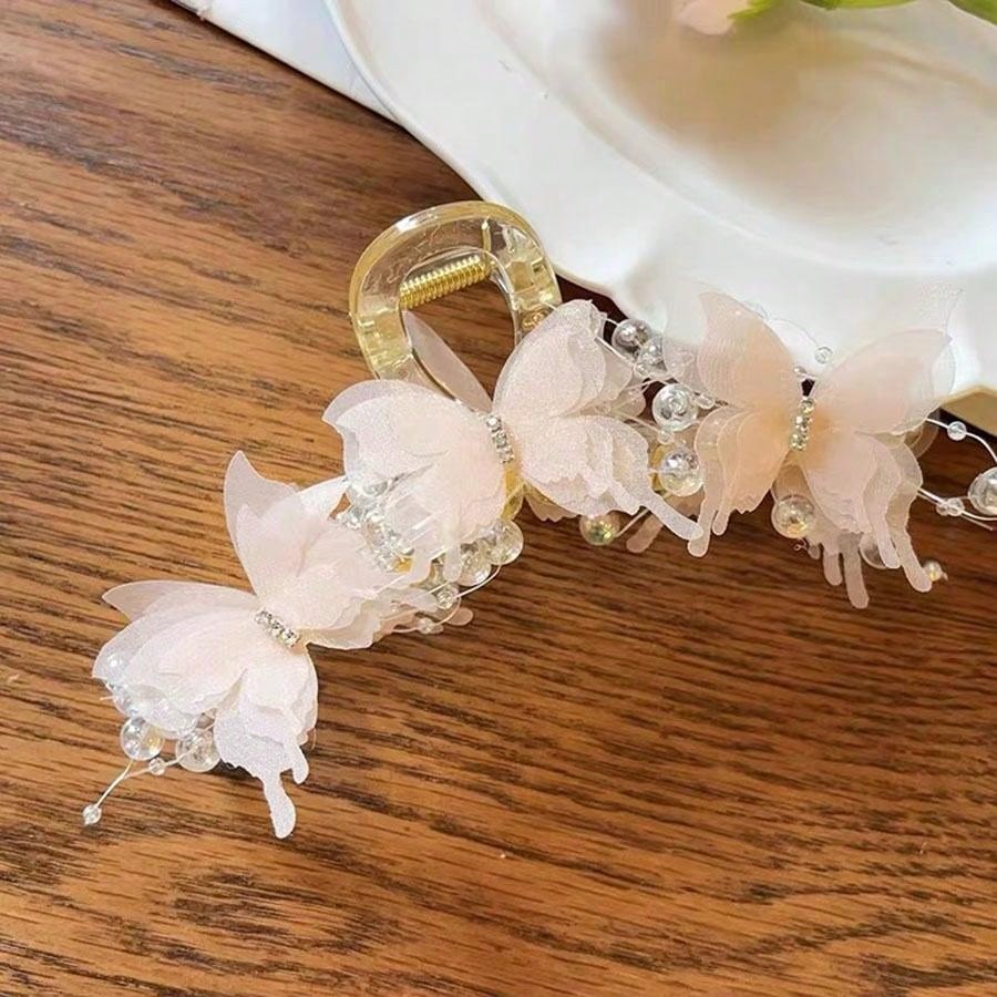 زرادية شعر جميلة ورقيقة من الشباك والخرز بشكل فراشة