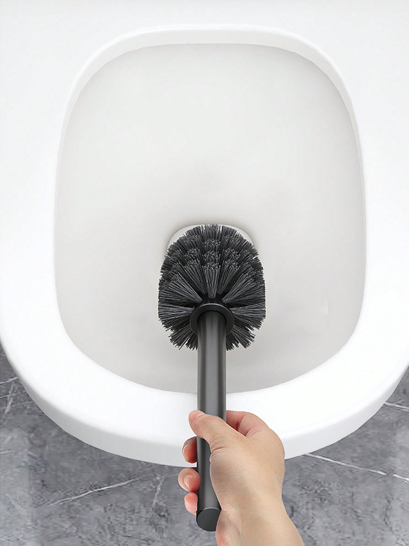 فرشاة مرحاض جدارية واحدة، من دون براغي، تنظيف الزوايا الميتة بدون زاوية يرافقه تصميم لتخزينها، تصميم مقبض ممتد، قاعدة الصرف المجوفة