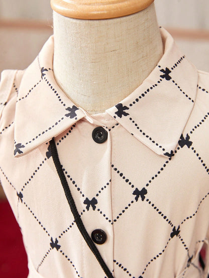 فستان فتاة رضيعة بنمط مربعات ماسية مزين بأربطة وطبعات