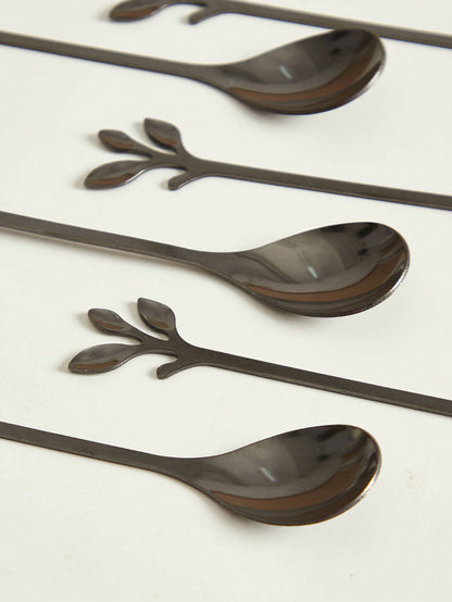 مجموعة ملعقة وشوكة بتصميم أوراق