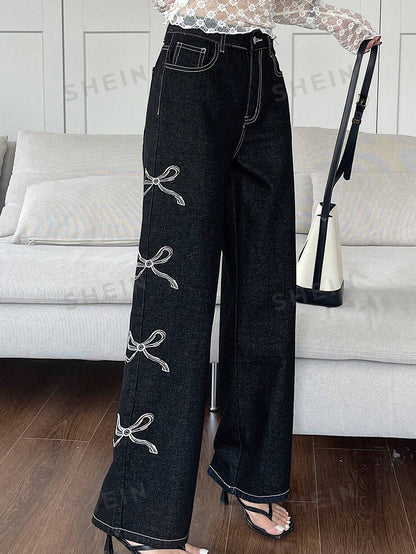 جينز واسع الساقين بطبعة القوس