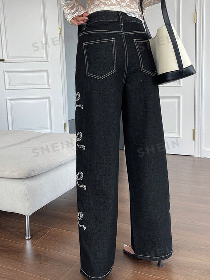 جينز واسع الساقين بطبعة القوس