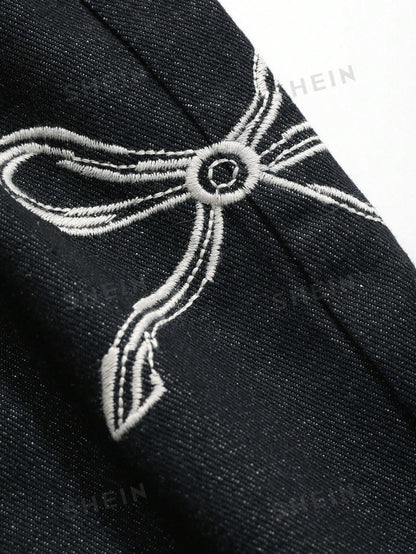 جينز واسع الساقين بطبعة القوس