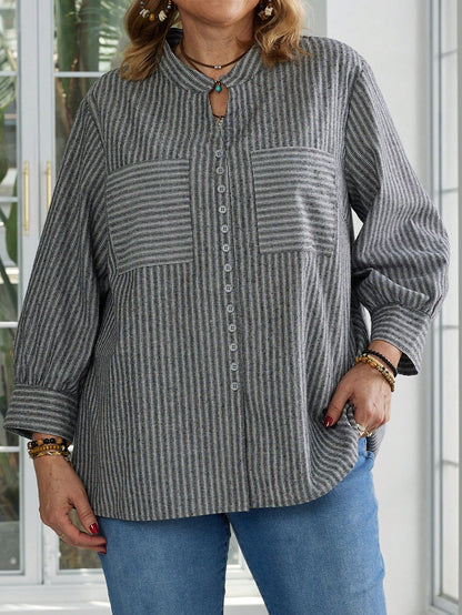 بلوزة كاجوال فضفاضة مخططة مع جيوب بأكمام طويلة