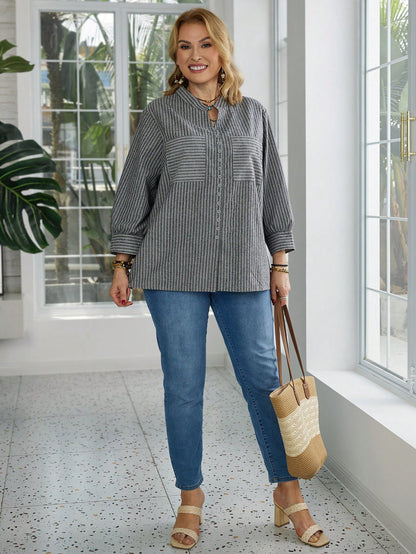 بلوزة كاجوال فضفاضة مخططة مع جيوب بأكمام طويلة