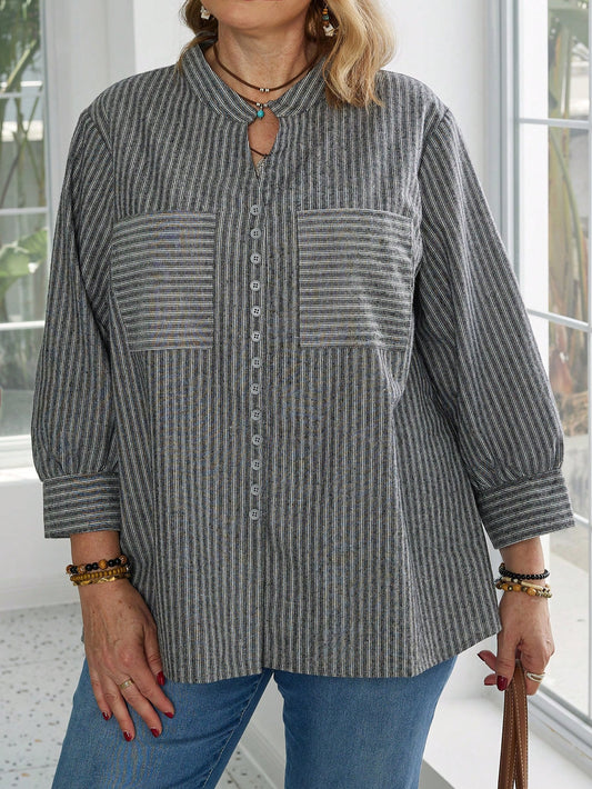 بلوزة كاجوال فضفاضة مخططة مع جيوب بأكمام طويلة