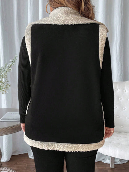 جاكيت أنيق للمرأة بياقة عالية ومجاثم بدون أكمام