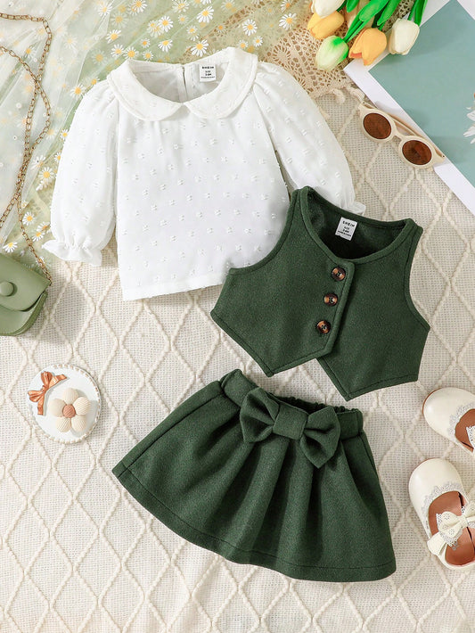 مجموعة تحتوي على ملابس علوية طويلة مزينةلأكمام  جاكيت بأزرار بلا أكمام في الأمام، وتنورة