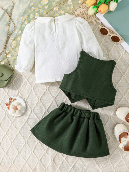 مجموعة تحتوي على ملابس علوية طويلة مزينةلأكمام  جاكيت بأزرار بلا أكمام في الأمام، وتنورة