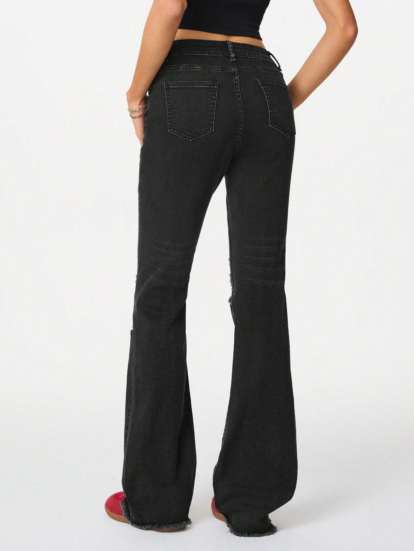 المتعثر باللون الأسود القابل للتمدد من قماش الدنيم المتوهج للهالوين